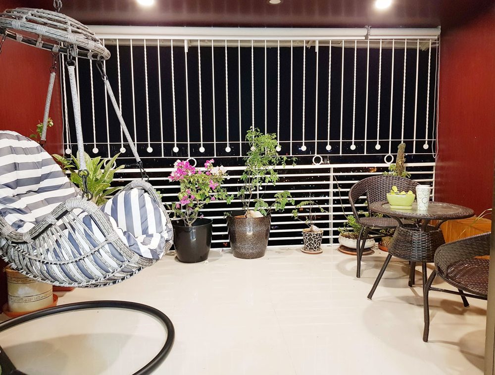 Balcony seating with hanging chair